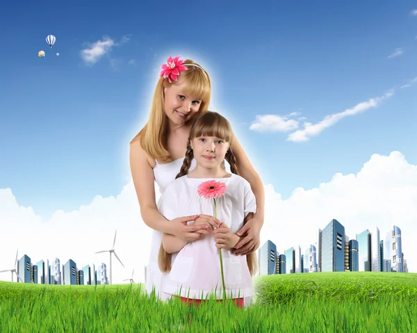 Collage with children and parents on green grass — Stock Photo, Image