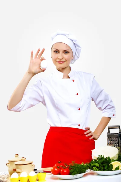 Portret van een jonge kok in uniform — Stockfoto