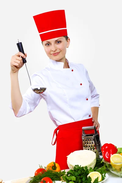 Portret van een jonge kok in uniform — Stockfoto