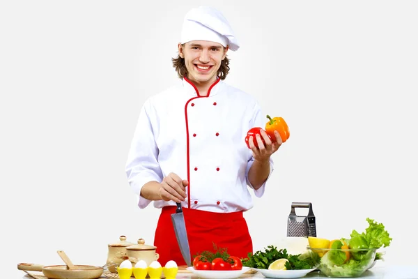 Portrait of a young cook in uniform Royalty Free Stock Images