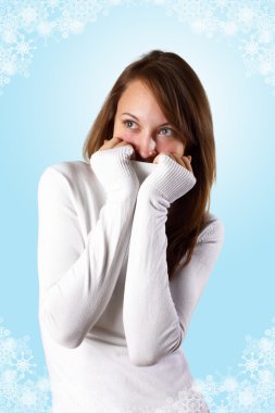 Young girl in white sweater