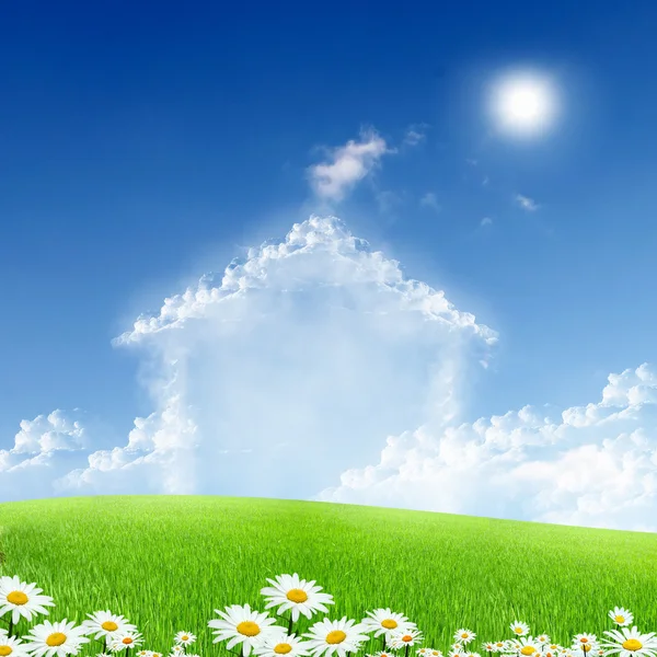 House from white clouds against blue sky — Stock Photo, Image