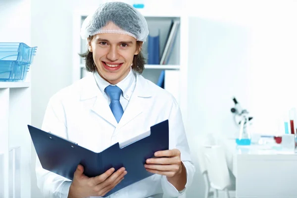 Young doctor in white uniform — Stock Photo, Image