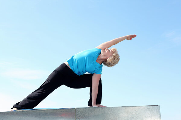 Portrait of a senior woman doing yoga