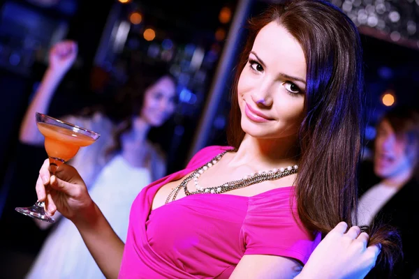 Young woman having fun at nightclub disco — Stock Photo, Image