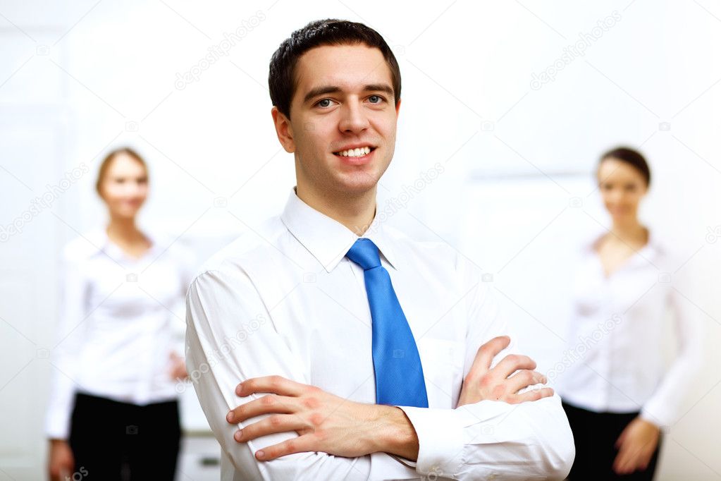 Young businessman at work in office