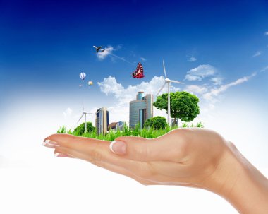 Human hand holding a green landscape clipart