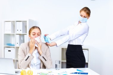 with cold and flu at work place clipart