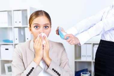 with cold and flu at work place clipart