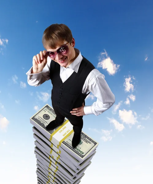 Mladý podnikatel se symboly peněz — Stock fotografie