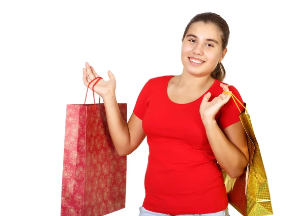 Pretty teenage girl with shopping bags — Stock Photo, Image