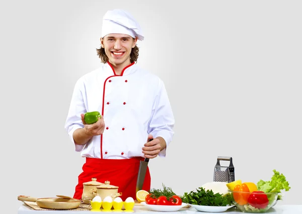 Portrait of a young cook in uniform Royalty Free Stock Photos