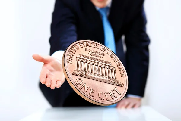 Mønt som symbol på risiko og held - Stock-foto