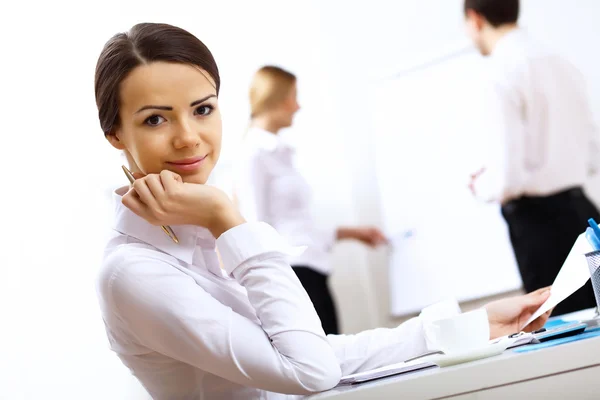 Portrait of a business woman in office Stock Image