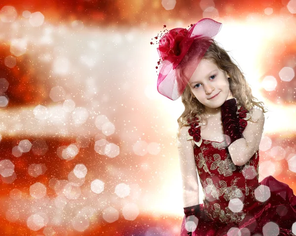 Kis lány öltözött fel szép ruhát — Stock Fotó