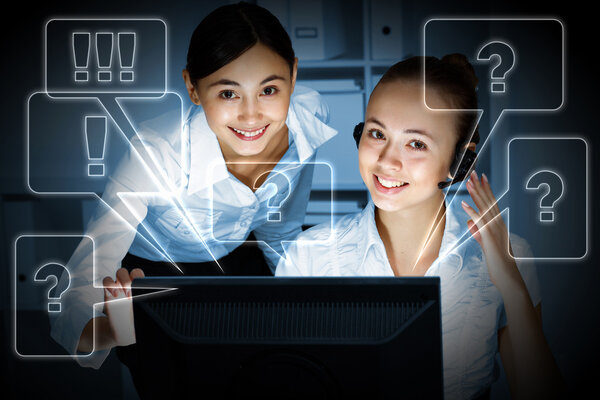 Young woman in business wear and headset