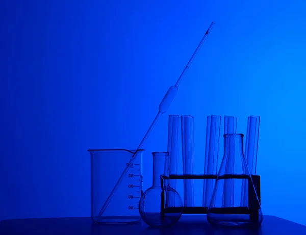 Chemistry laboratory equipment and glass tubes — Stock Photo, Image