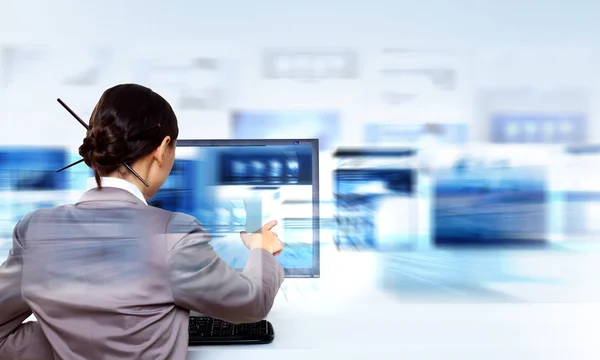 Businesswoman working with virtual digital screens — Stock Photo, Image