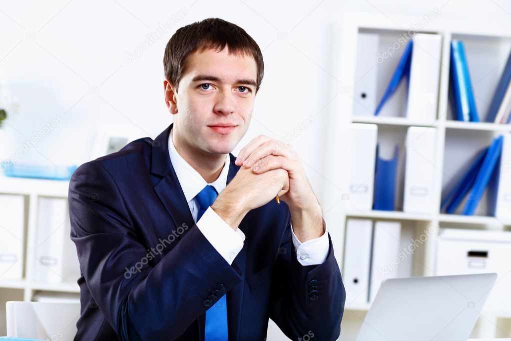 Young businessman in office