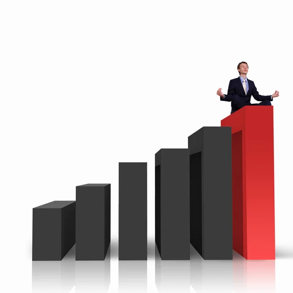 Businessman on Top of financial charts — Stock Photo, Image