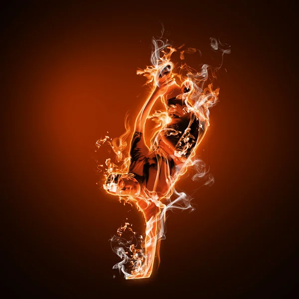 Fire dancer against black background — Stock Photo, Image