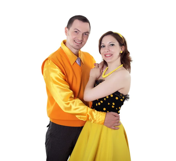 跳舞对年轻夫妇在明亮的颜色穿 — 图库照片