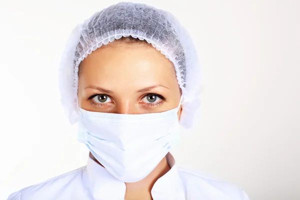 Young female scientist wearing face mask — Stock Photo, Image