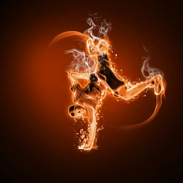 stock image Fire dancer against black background