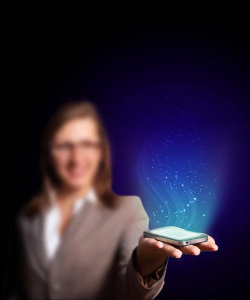 Business woman holding a mobile phone — Stock Photo, Image