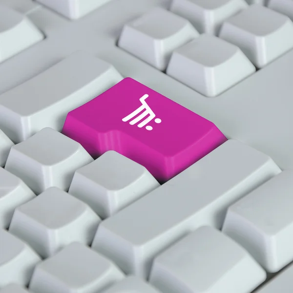 オンライン ショッピングのシンボルとコンピューターのキーボード — ストック写真