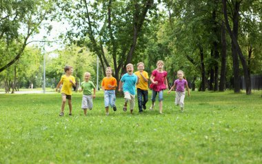 Group of children in the park clipart