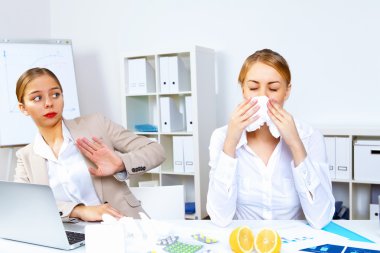 with cold and flu at work place clipart