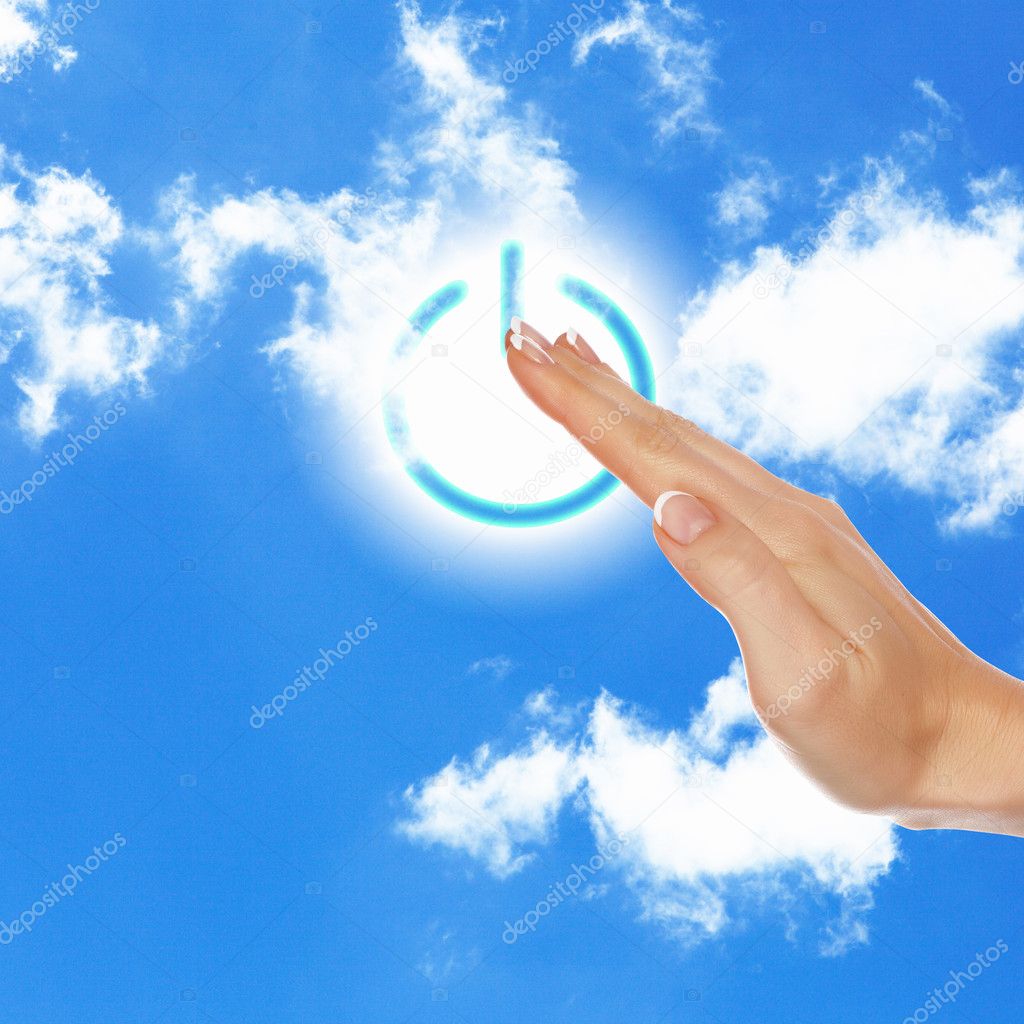 Power button against sky background