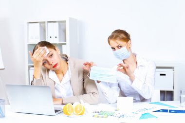 with cold and flu at work place clipart