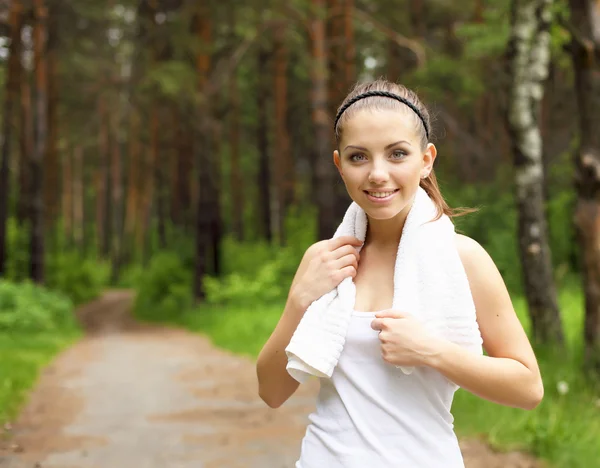 Young woman doing sport outdoors — Stock Photo, Image