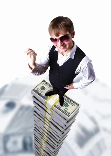 Молодий бізнесмен з грошовими символами — стокове фото