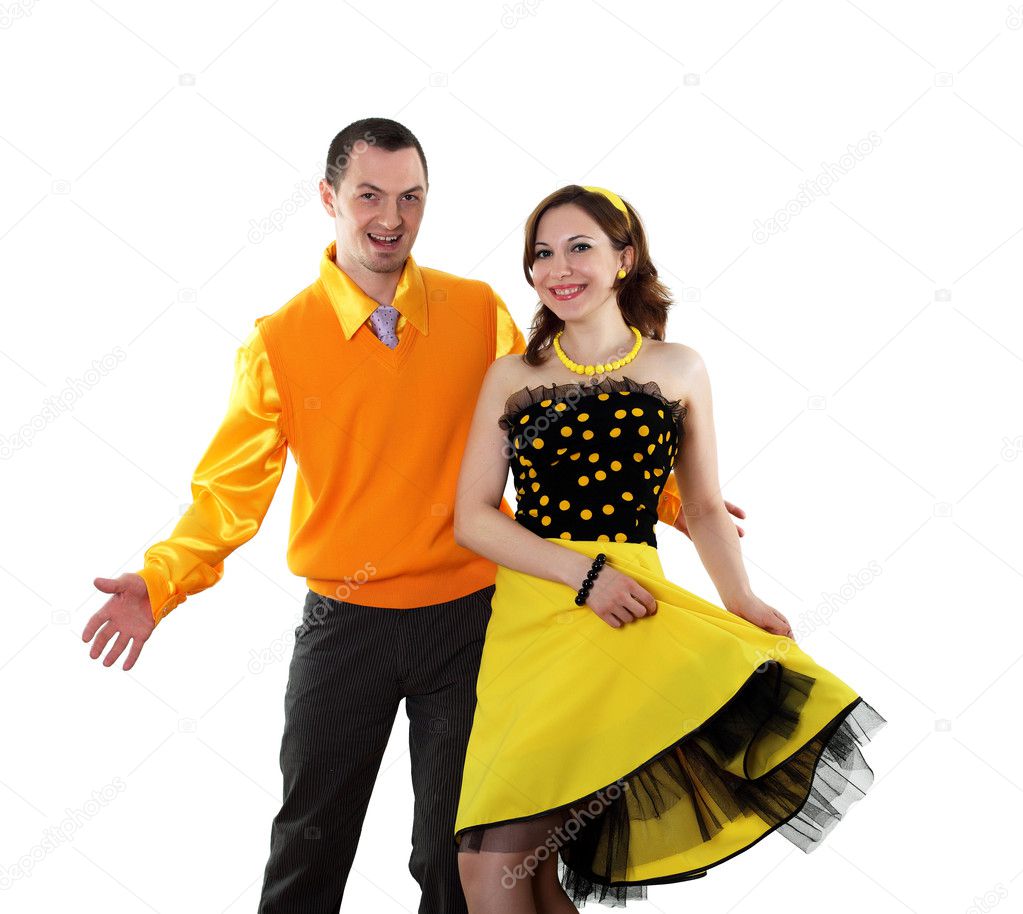 Young dancing couple in bright colour wear