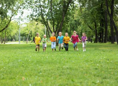 Group of children in the park clipart