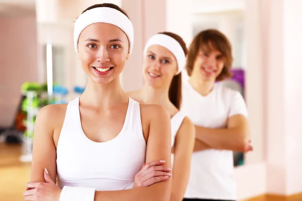 Young woman doing sport in gym — Stock Photo, Image