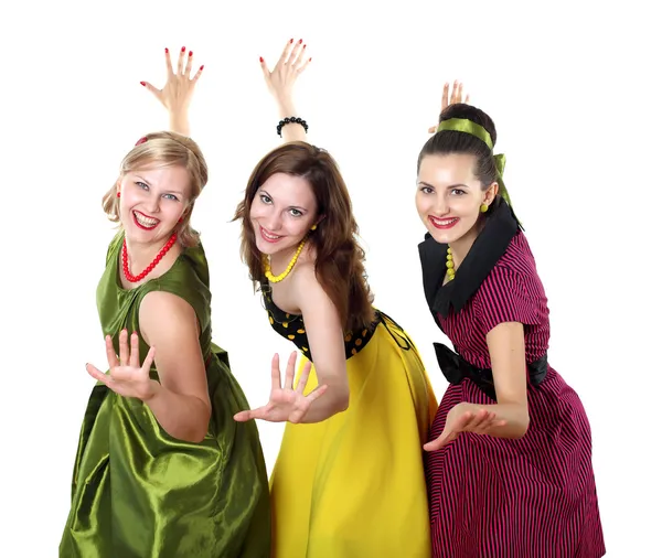 Tres mujeres jóvenes en vestidos de color brillante —  Fotos de Stock