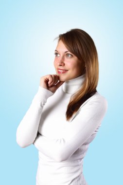 Young girl in white sweater