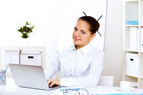 Young beautiful woman in business wear at work — Stock Photo, Image