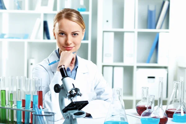 Young scientist working in laboratory Royalty Free Stock Images