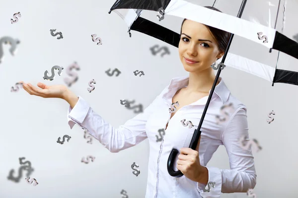 Mujer de negocios bajo lluvia de dinero con paraguas —  Fotos de Stock