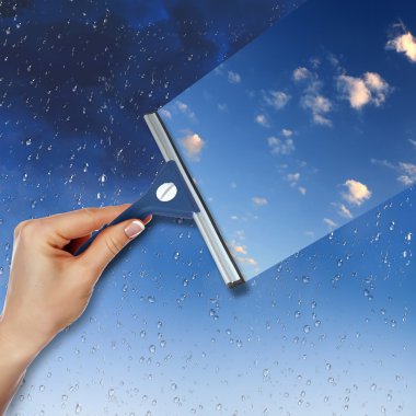 Window with blue sky and white clouds clipart