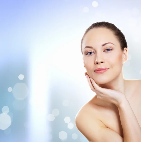 Young woman with water splashes — Stock Photo, Image