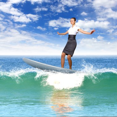 Businesswoman surfing on the sea waves clipart