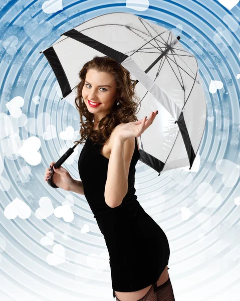 Vrouw gekleed in retro stijl met paraplu — Stockfoto