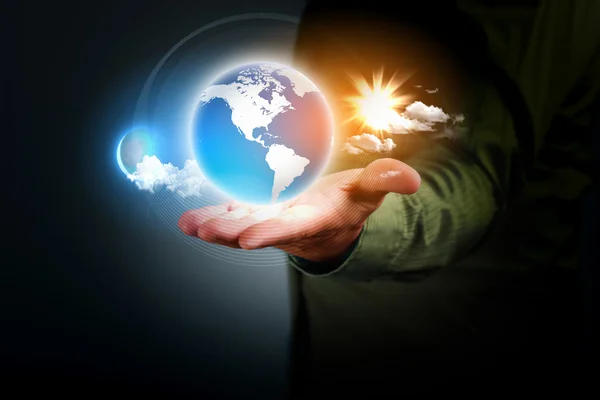 Human hand holding earth — Stock Photo, Image