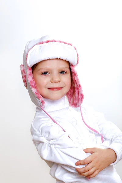 Gyerek, a téli viselet fehér háttér — Stock Fotó